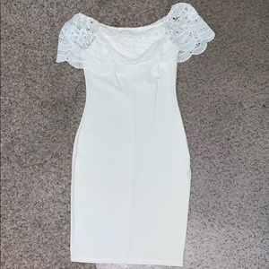 White off-the-shoulder tight dress